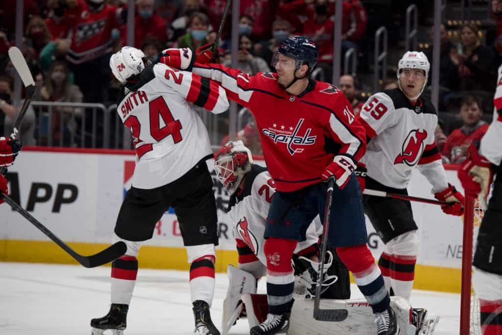 Capitals Forward Garnet Hathaway Punching New Jersey Devils Ty Smith In Front of Net from Washington Capitals vs. New Jersey Devils (2 Jan 2022)